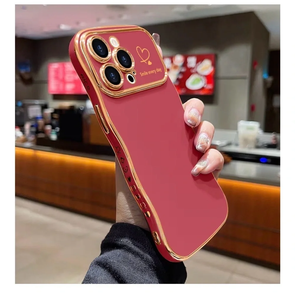 NWOT Faint Red Wave Phone Case for 15 Pro with Gold Trim.